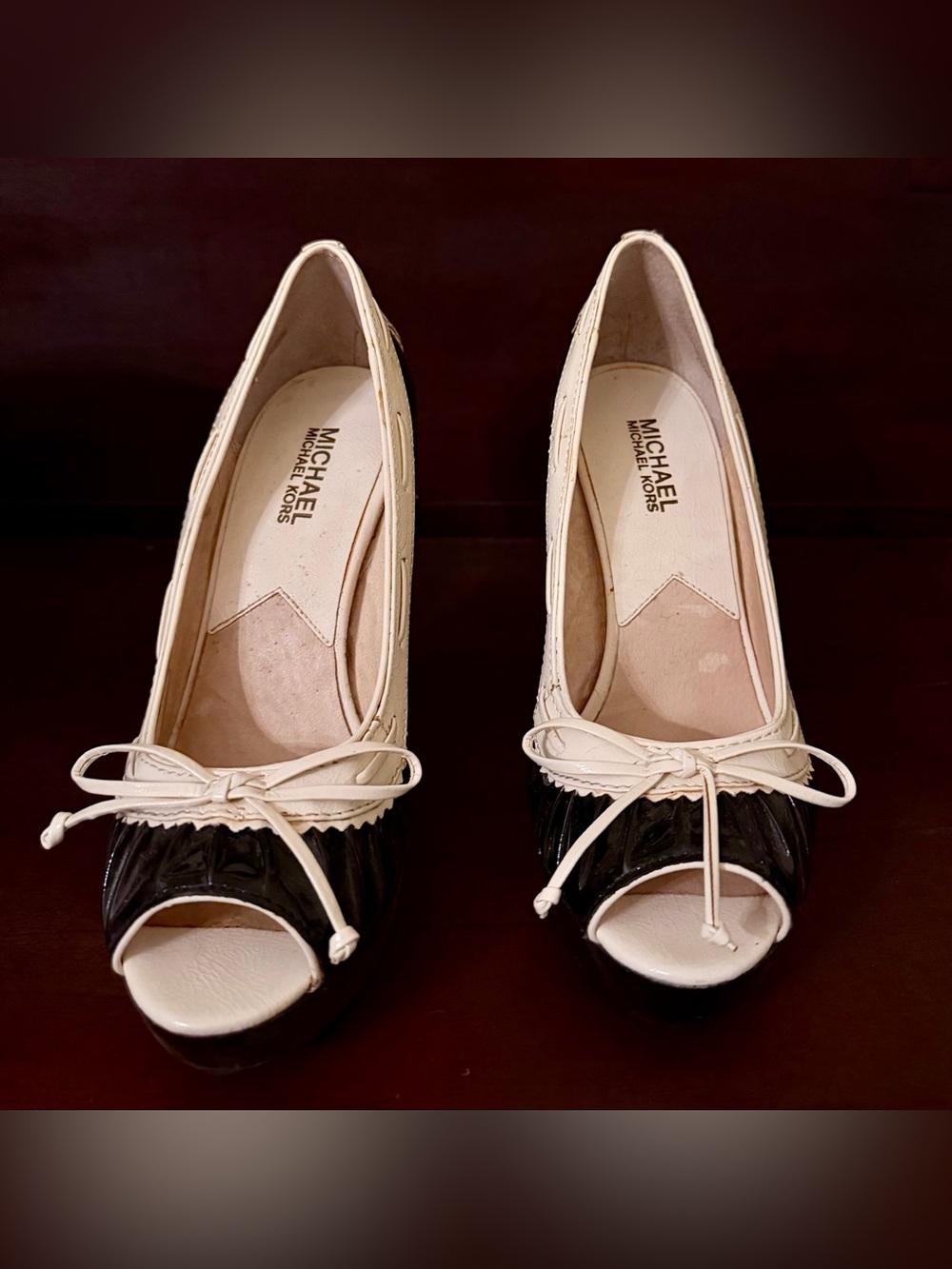 Michael Kors size 7.5 heels 
Black and cream